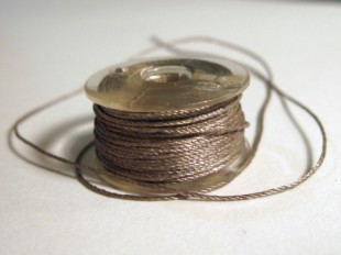 Bobbin of conductive thread